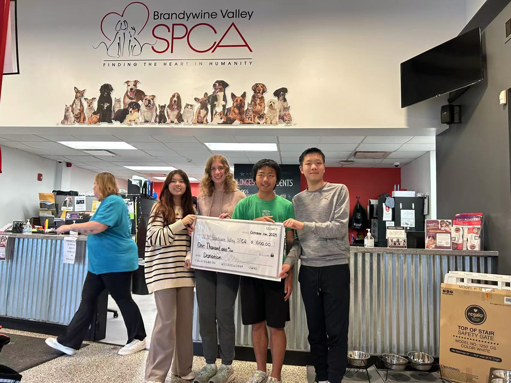 Members presenting a donation check at Brandywine Valley SPCA, October 2025